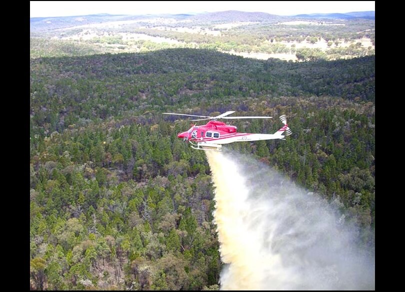 Helicopter dropping retardant Currumbenya Goobang National Park