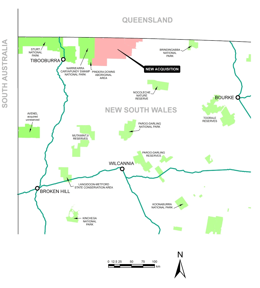 Map of part of Australia highlighting areas of new acquisition in New South Wales, near the border with Queensland and South Australia. The map features various marked locations such as Tibooburra, Broken Hill, Wilcannia, and Bourke. Green areas represent national parks and reserves, while pink shading indicates the new acquisition area. A compass rose is present in the lower right corner indicating north.