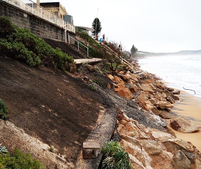 A beachside embankment show clear signs of erosion at Wamberal Beach 18 July 2020.