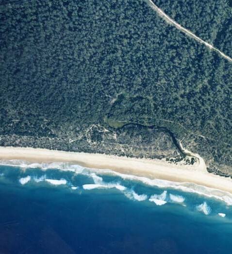 A view of Bengello Creek and Bengello Beach near the seaside town of Broulee