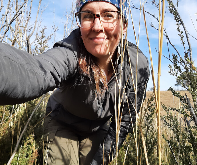 Laura takes a selfie in tall native grass