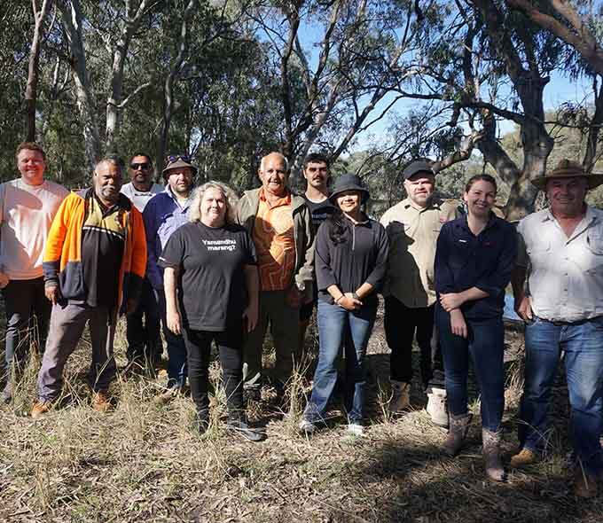 Workshop participants standing together. 