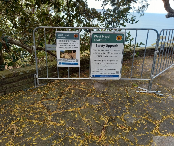 Signage at West Head Lookout on the recent lookout and safety upgrades informing visitors on the installation of temporary fencing and repairs in place.