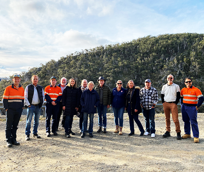 Group photo of Snowy Advisory Committee taken at a field trip to Tantangara Dam