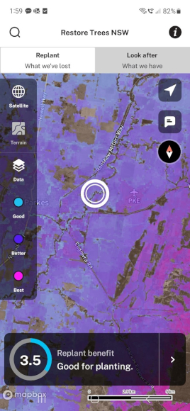 View of the Restore Trees NSW app on mobile, showing the 'Replant' map setting and the 'Replant benefit' score for a selected area.