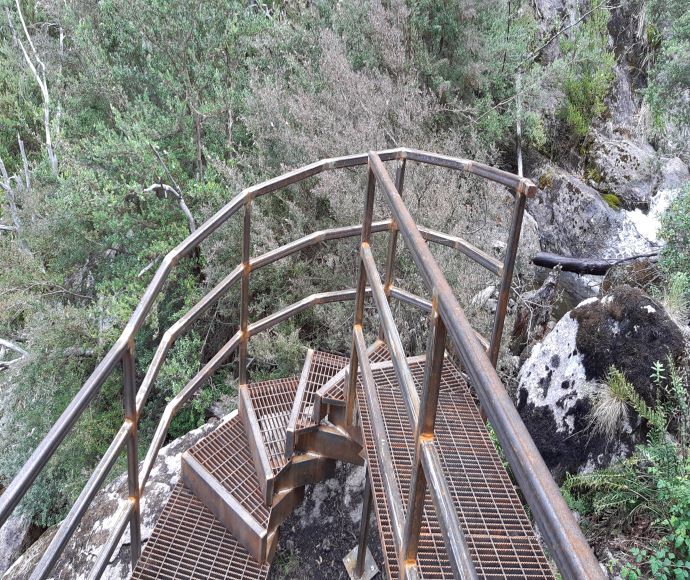 Elevated metal grid walkway and stairs going down, Stage 4 Snowies Alpine Walk