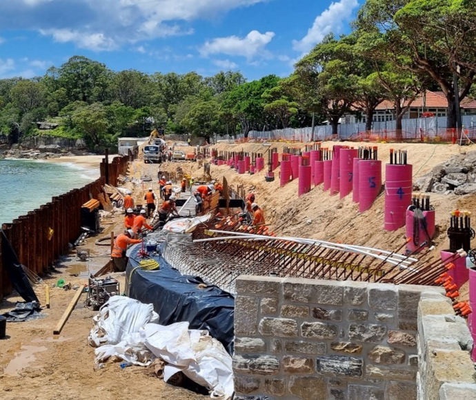 Workers pouring concrete to capping beam at Nielsen Park seawall