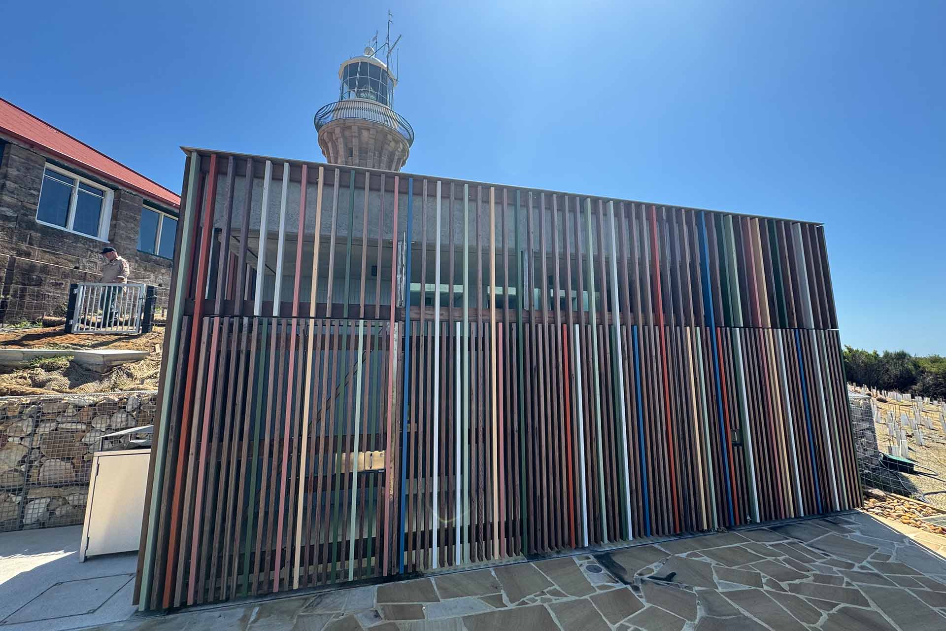 A building featuring wooden palings