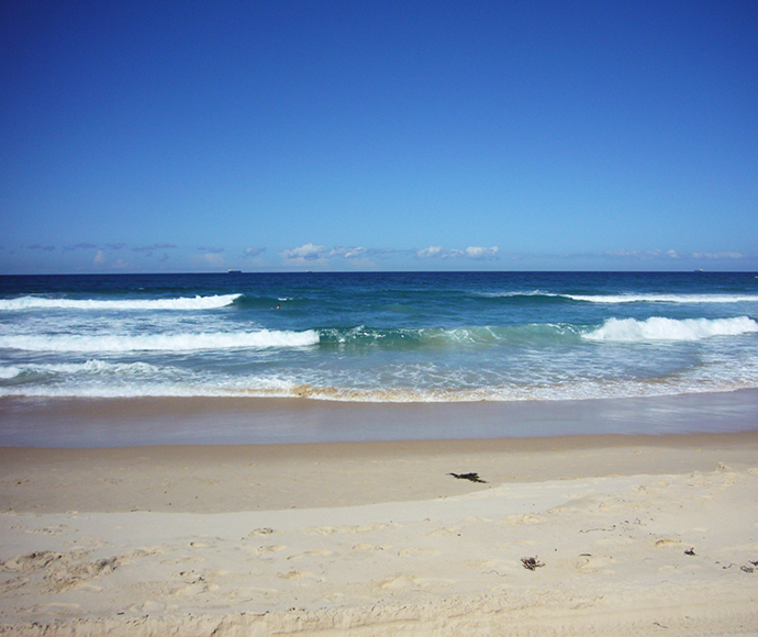 Beach with rip shown as gap in waves