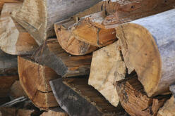 Stack of chopped wood piled up neatly.