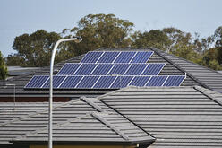 Solar panels on the roof or a suburban house in Glenfield, South West Sydney, NSW